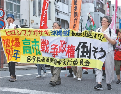 日本政府加速推进“再军事化”动向引发各界广泛担忧和强烈批评——“必须站出来，阻止高市政府把日本再次拖向战争”（国际视点）